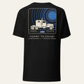 Back of black Coast to Coast Milestone Tee with a large printed mission-patch style graphic