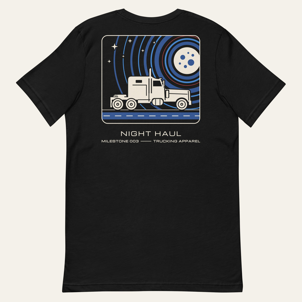 Flat lay of the black Night Haul Milestone Tee, back view with the printed mission-patch style graphic