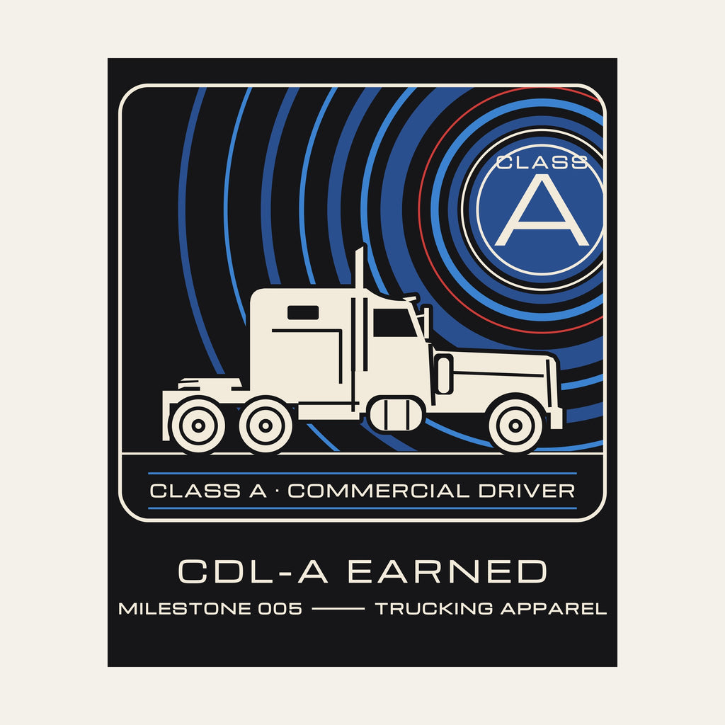 Close-up of the printed CDL-A Earned patch-style graphic on the back of a black tee