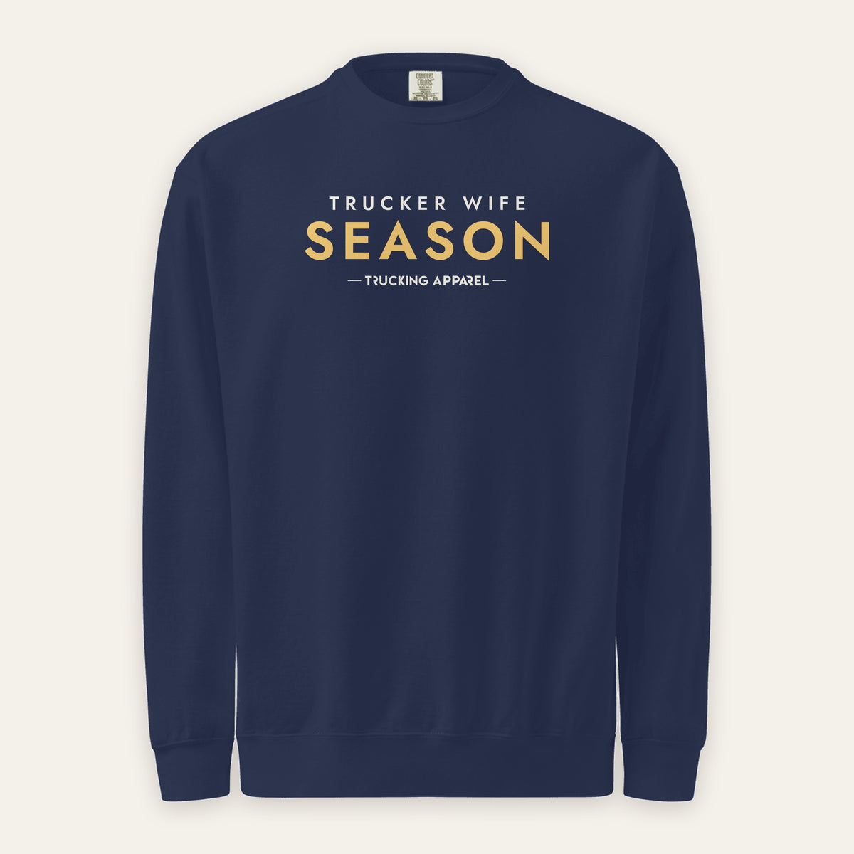 Trucker Wife Season Crewneck in True Navy, front view, TRUCKER WIFE SEASON lettering, on a cream background
