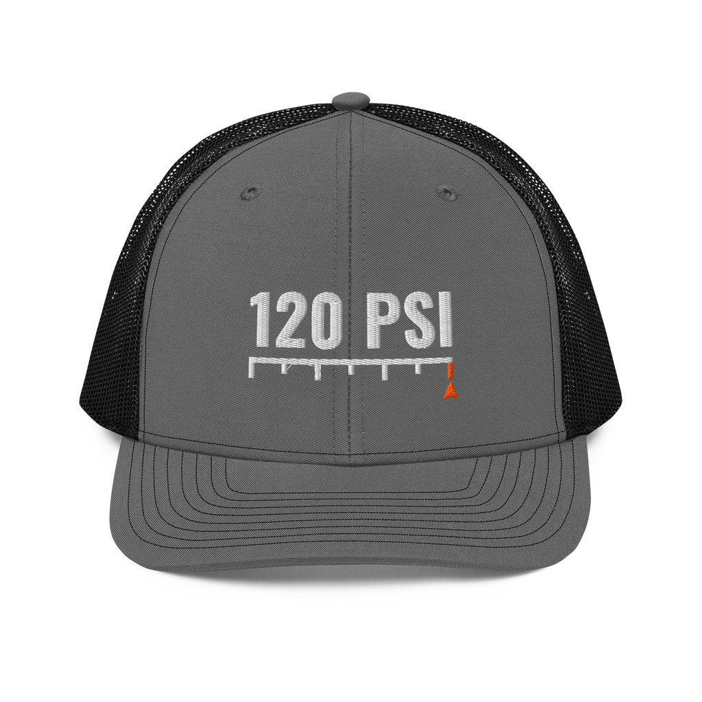 120 PSI Trucker Hat, charcoal and black Richardson 112 mesh-back cap with 120 PSI in white embroidery over a gauge scale with an orange needle, front view