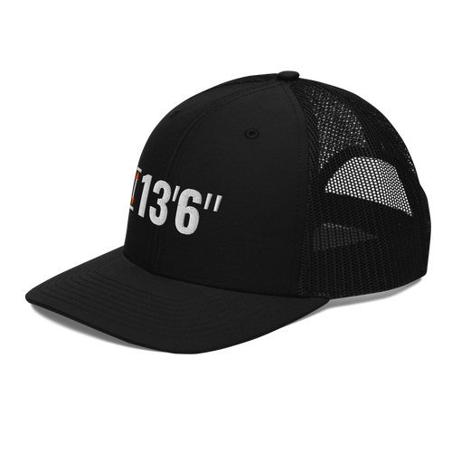 13'6" Clearance Trucker Hat, black Richardson 112 mesh-back cap with 13'6" in white embroidery with an orange height marker, left front angle