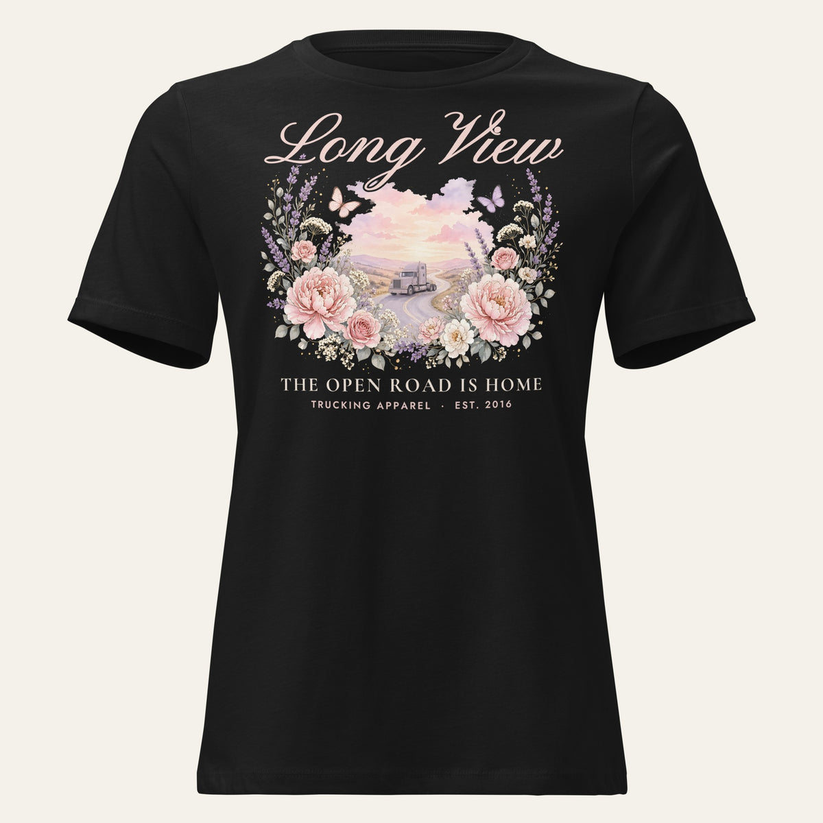 Black Long View Women's Tee, front view with a watercolor floral wreath around a long-nose sleeper truck on a winding road