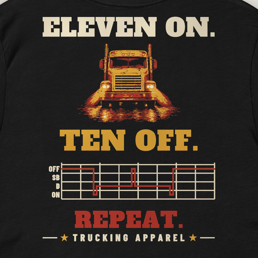 Eleven On. Ten Off. Repeat. Trucker Tee in black, close-up of the back print: ELEVEN ON. TEN OFF. REPEAT. back print with a semi truck and a driver log grid. Design made with AI assistance.