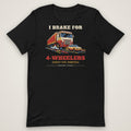 I Brake For 4-Wheelers Trucker Tee in black, front view laid flat showing the full front print. Design made with AI assistance.