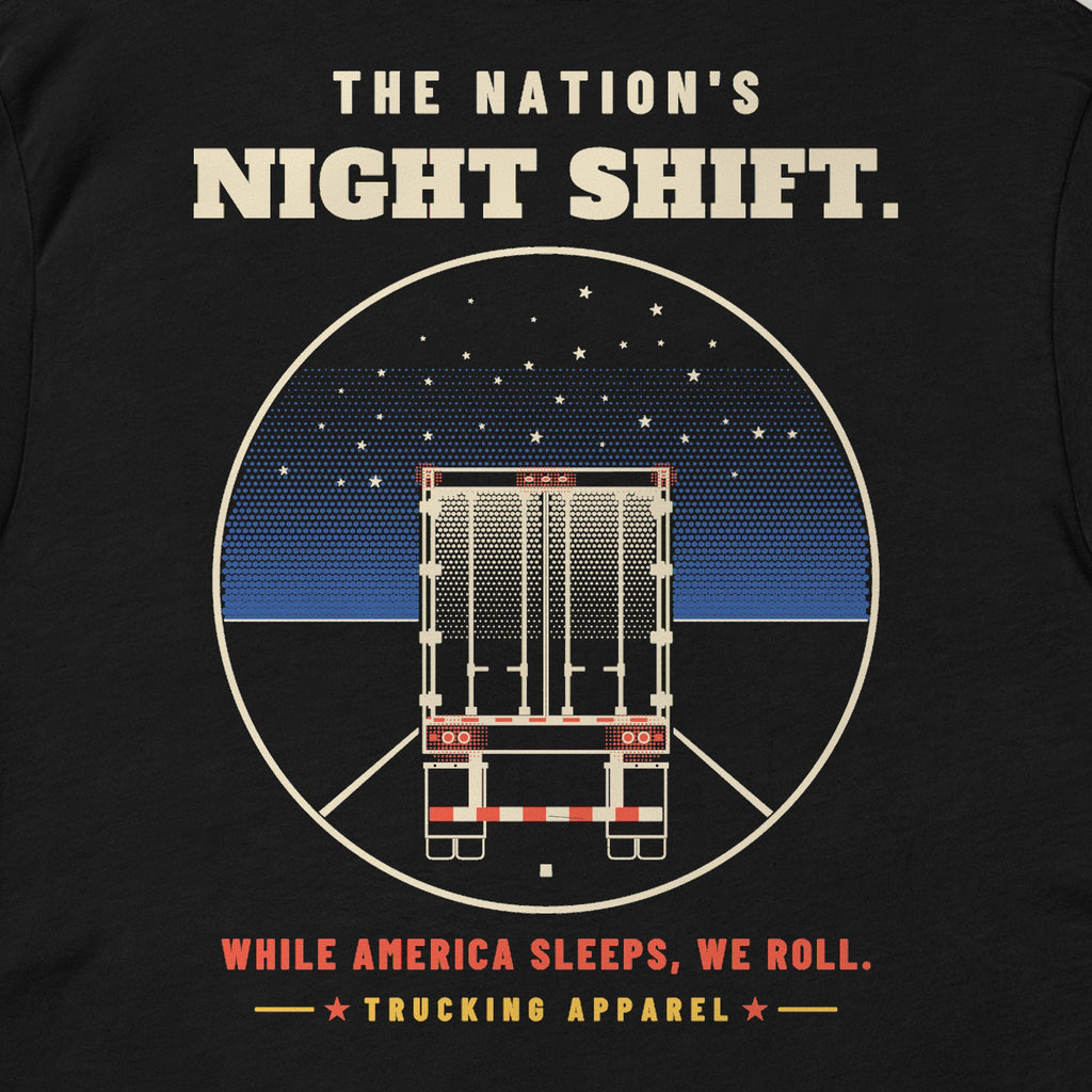 The Nation's Night Shift Tee in black, close-up of the back print reading THE NATION'S NIGHT SHIFT: a trailer's rear view on a night highway under stars.