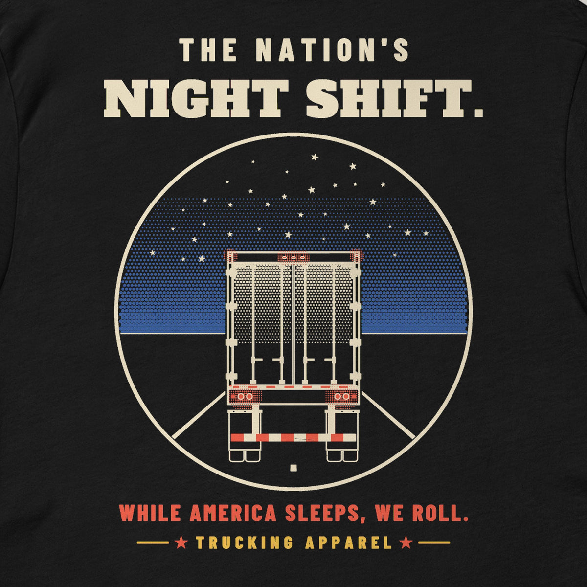 The Nation's Night Shift Tee in black, close-up of the back print reading THE NATION'S NIGHT SHIFT: a trailer's rear view on a night highway under stars.