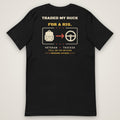 Traded My Ruck for a Rig Tee in black, back view laid flat showing the TRADED MY RUCK FOR A RIG back print: a rucksack, an arrow and a steering wheel.