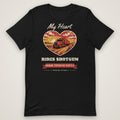 My Heart Rides Shotgun Trucker Family Tee in black, front view laid flat showing the full front print. Design made with AI assistance.