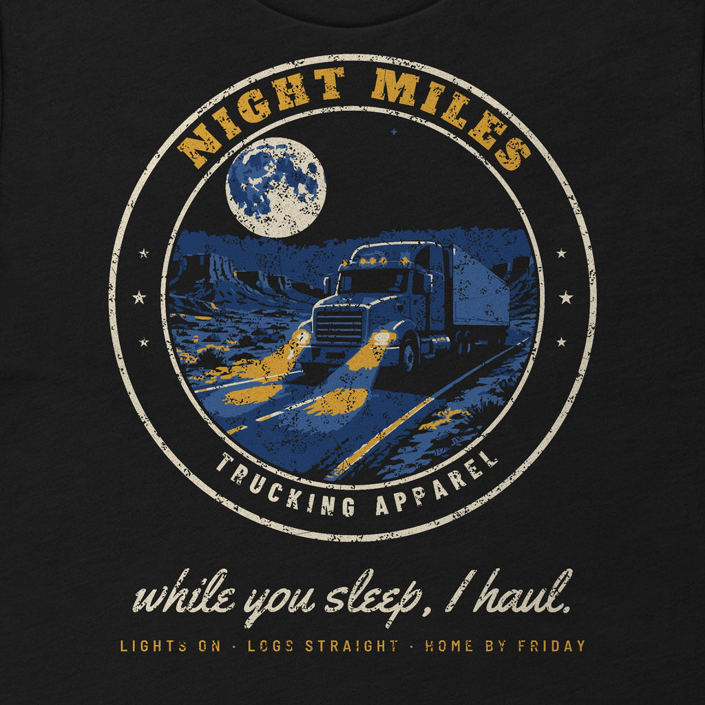 Night Miles Trucker Tee in black, close-up of the front print. Design made with AI assistance.