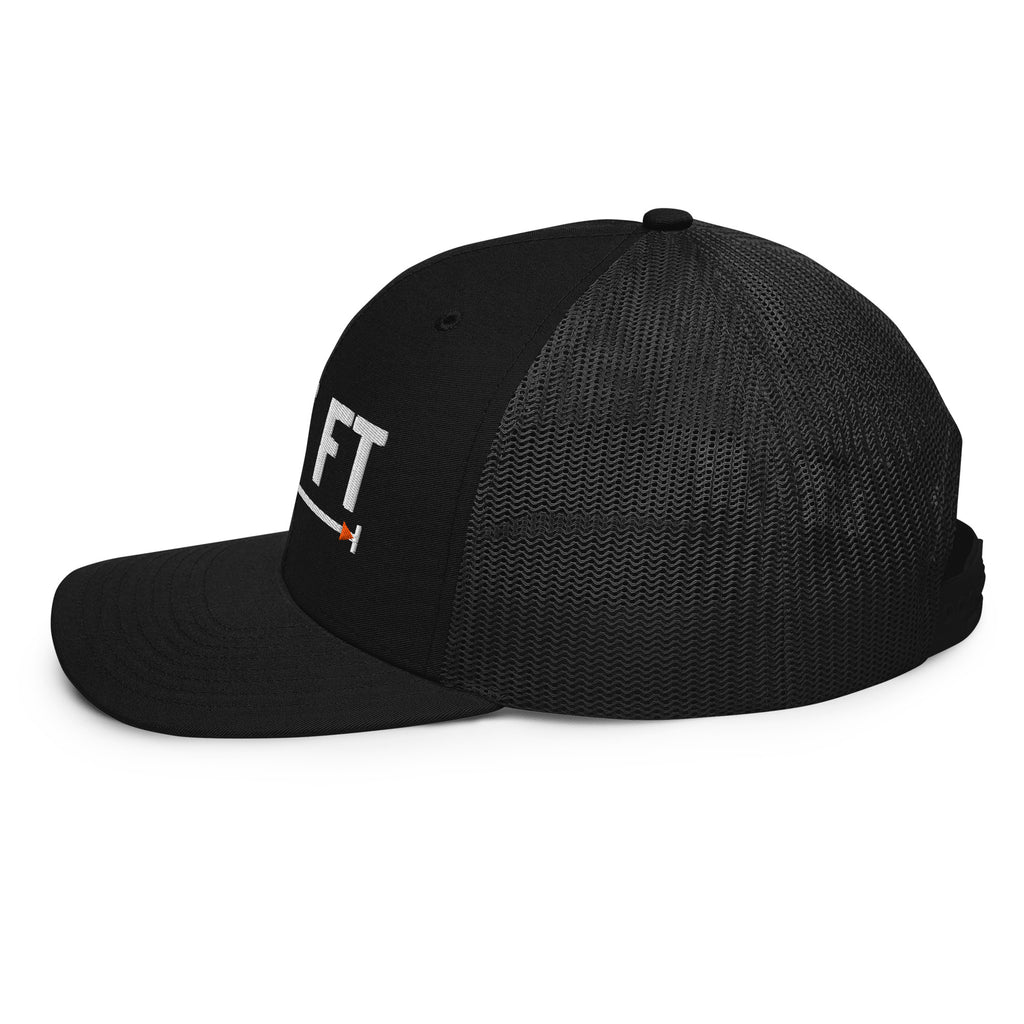 525 FT Trucker in black, left side view.