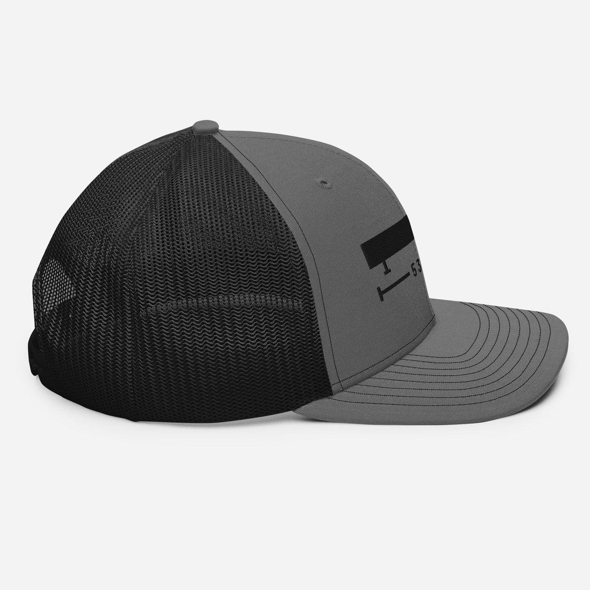 53 FT Trucker in charcoal black, right side view.