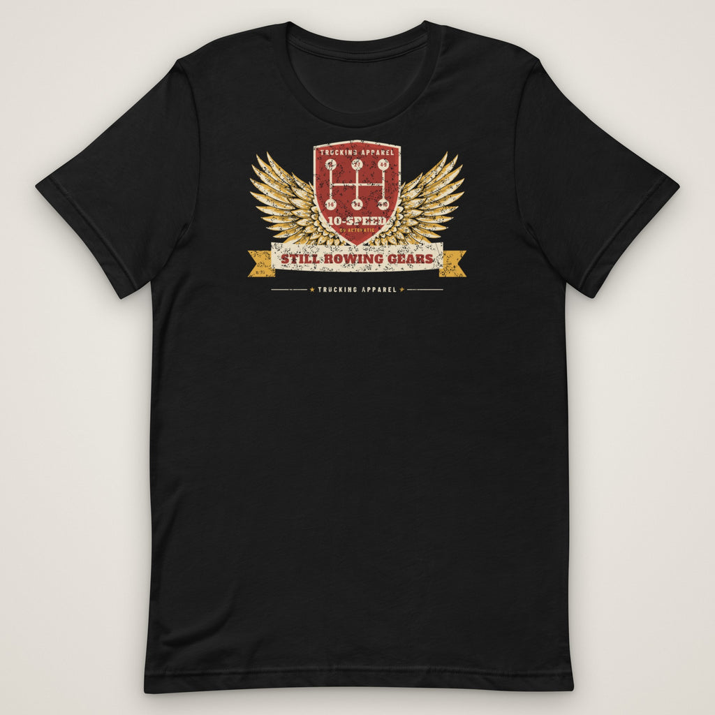 Still Rowing Gears 10-Speed Trucker Tee in black, front view laid flat showing the full front print. Design made with AI assistance.