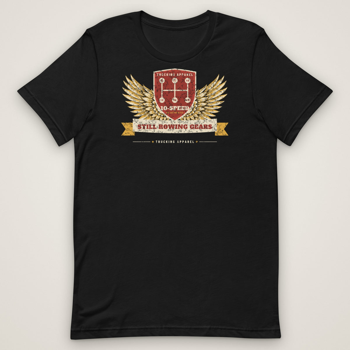 Still Rowing Gears 10-Speed Trucker Tee in black, front view laid flat showing the full front print. Design made with AI assistance.