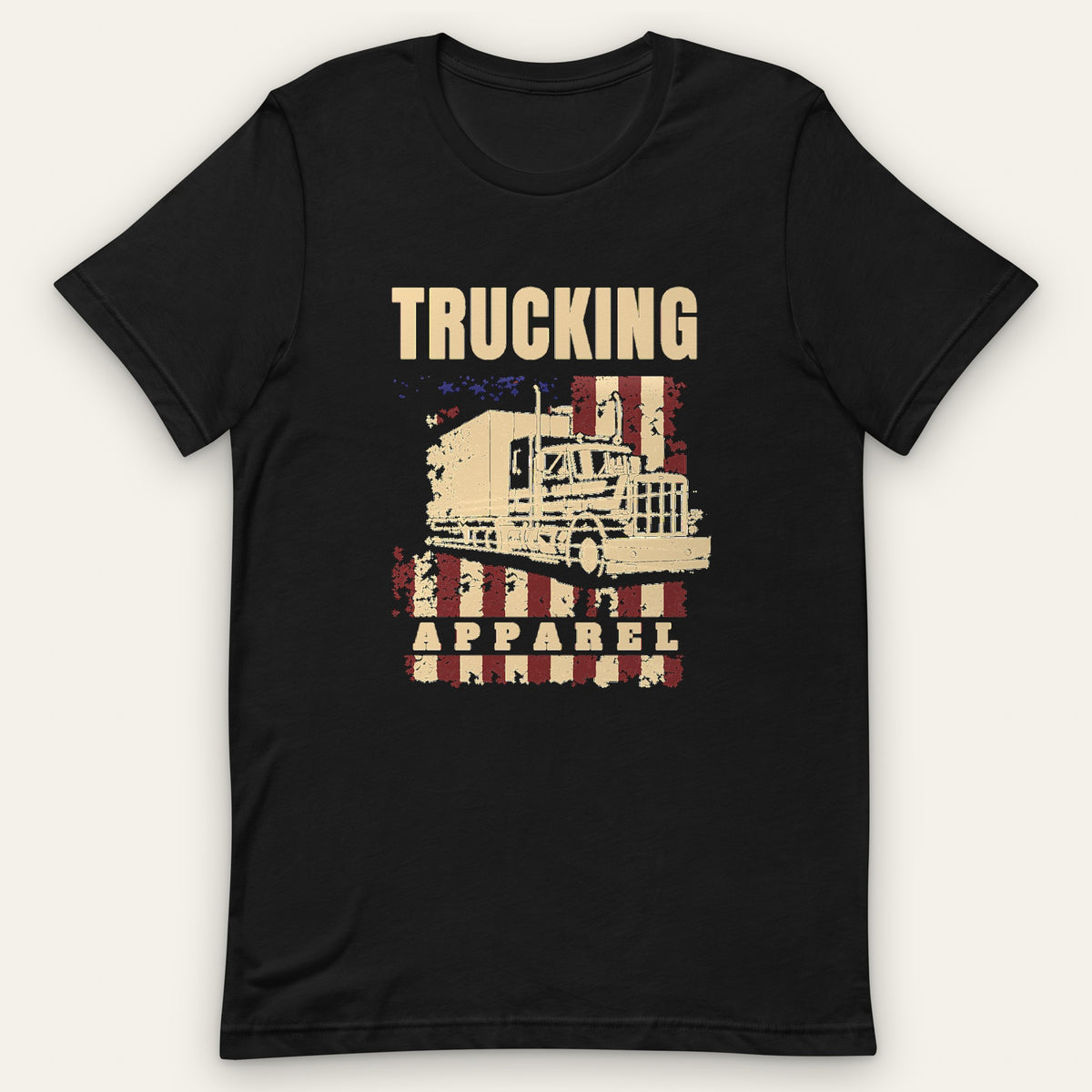 Stars & Stripes Big Rig Tee, front view laid flat showing a tall TRUCKING headline over a big rig on stars and stripes, with APPAREL on a band across the flag.