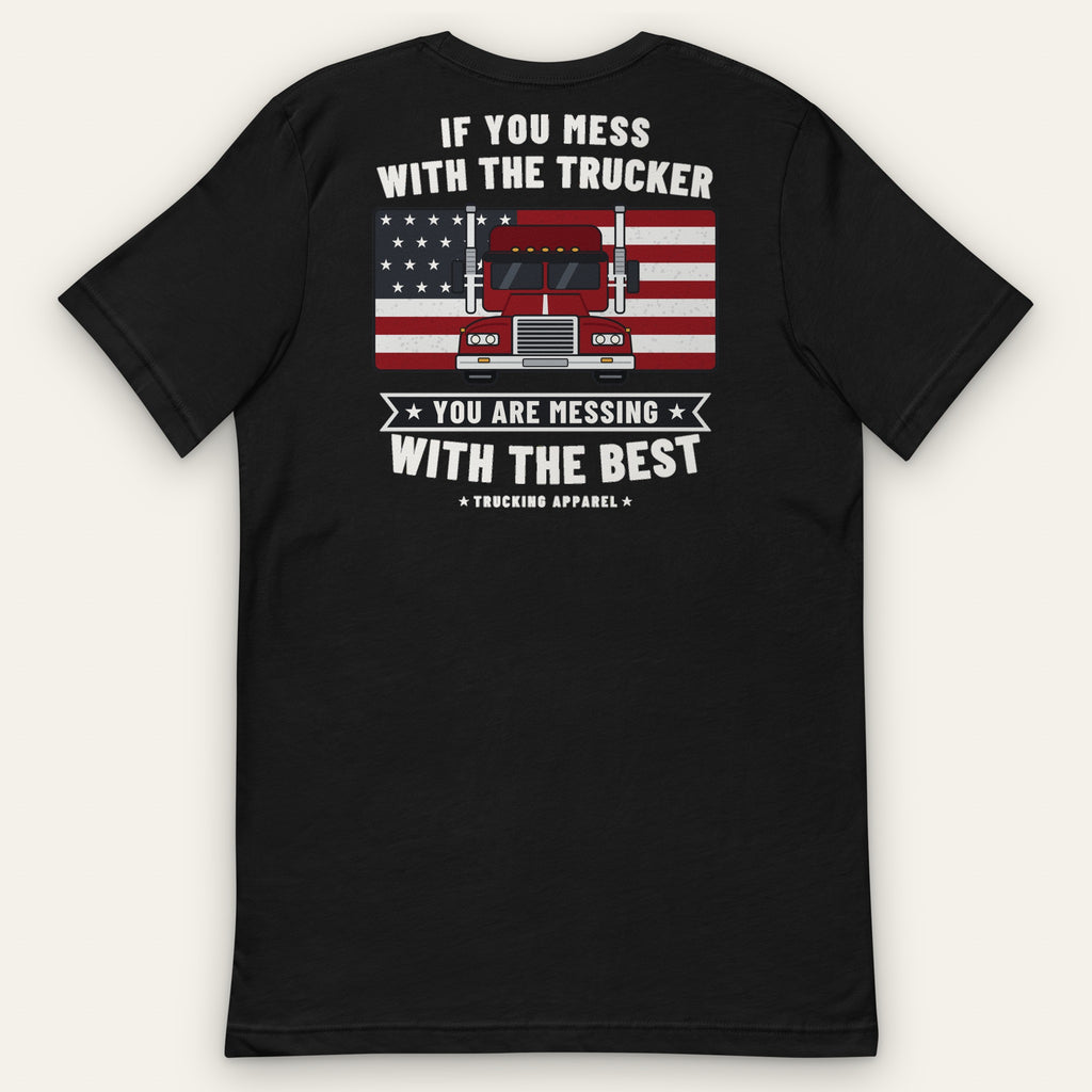 Ruled by an American Trucker Tee, back view laid flat showing IF YOU MESS WITH THE TRUCKER over a red front-view rig on an American flag, with YOU ARE MESSING WITH THE BEST and the Trucking Apparel signature below.