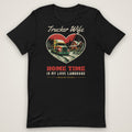 Trucker Wife Tee: Home Time Is My Love Language in black, front view laid flat showing the full front print. Design made with AI assistance.