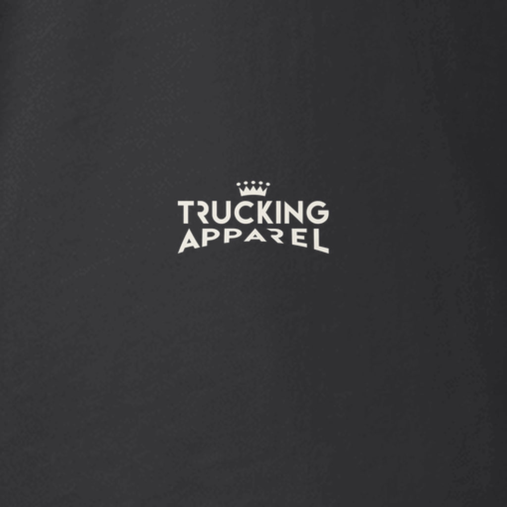 Trucking Cas Tee in black heather, close-up of the cream Trucking Apparel crown logo on the left sleeve.
