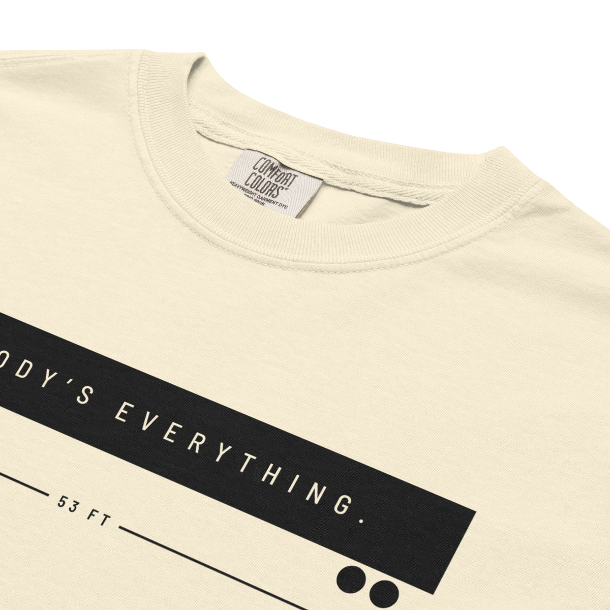 Somebody's Everything Tee in ivory, close-up of the print.